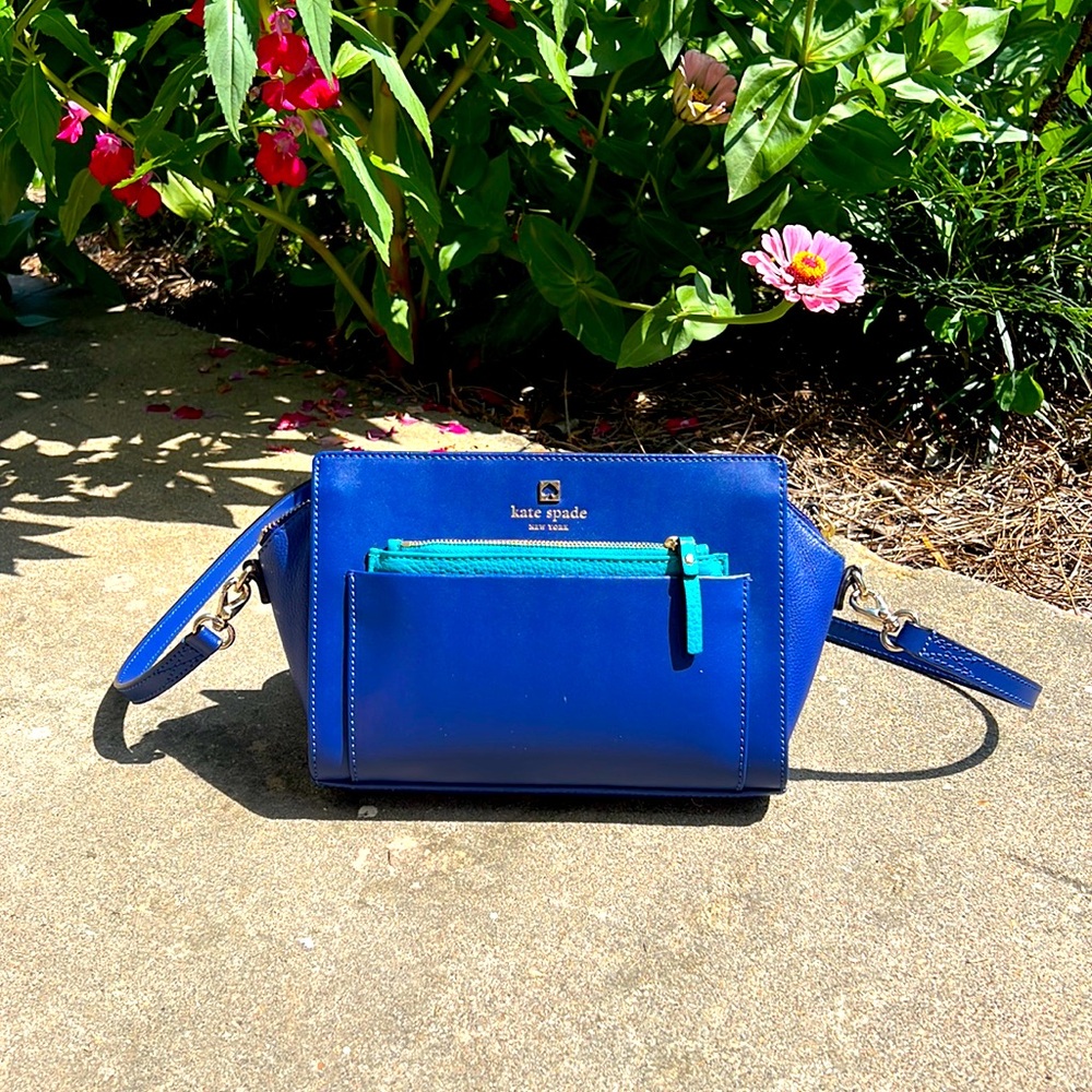 Blue Kate Spade purse with removable strap